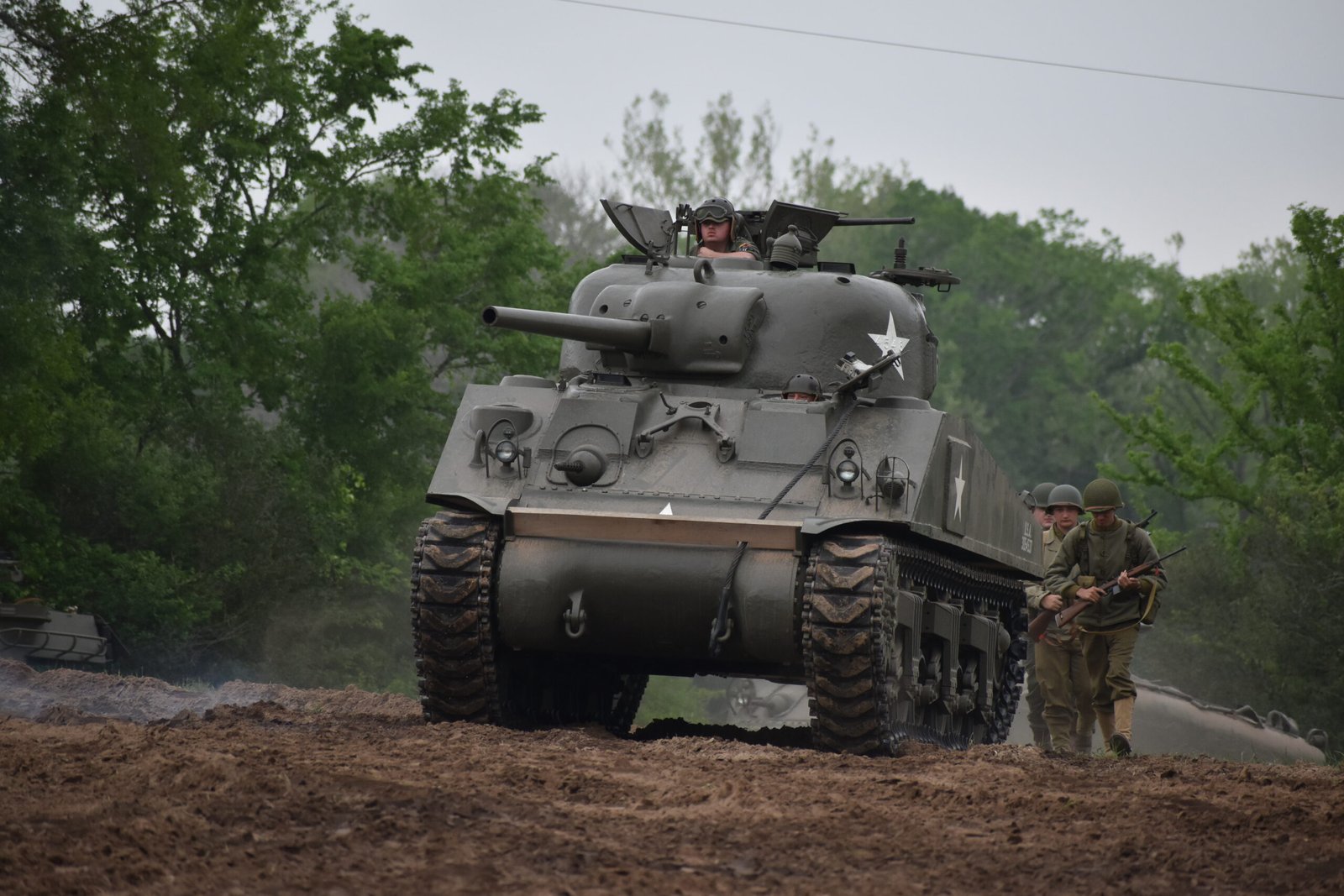 A Sherman medium tank joins the battle